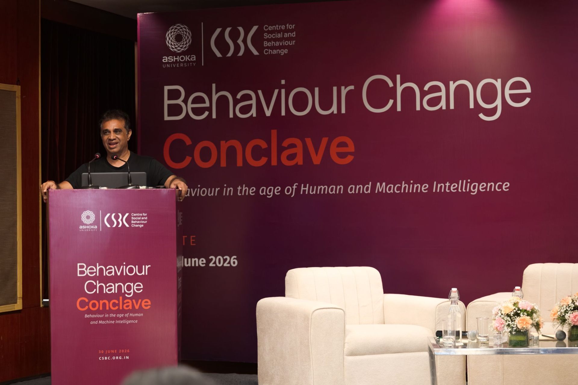 Anand Mallipudi presenting on AI and human wellbeing at CSBC